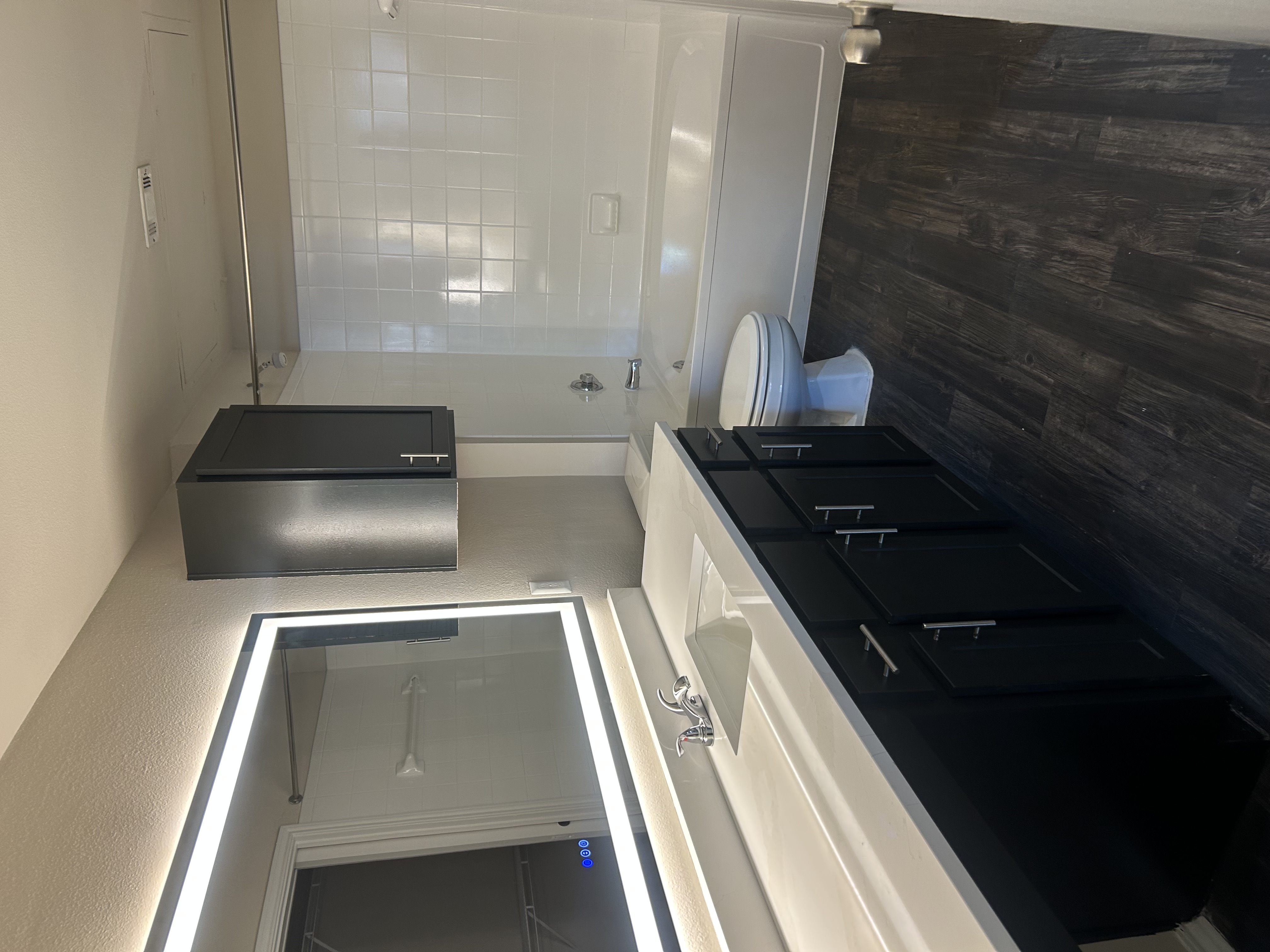 Updated bathroom sink and bath at Allura Las Colinas