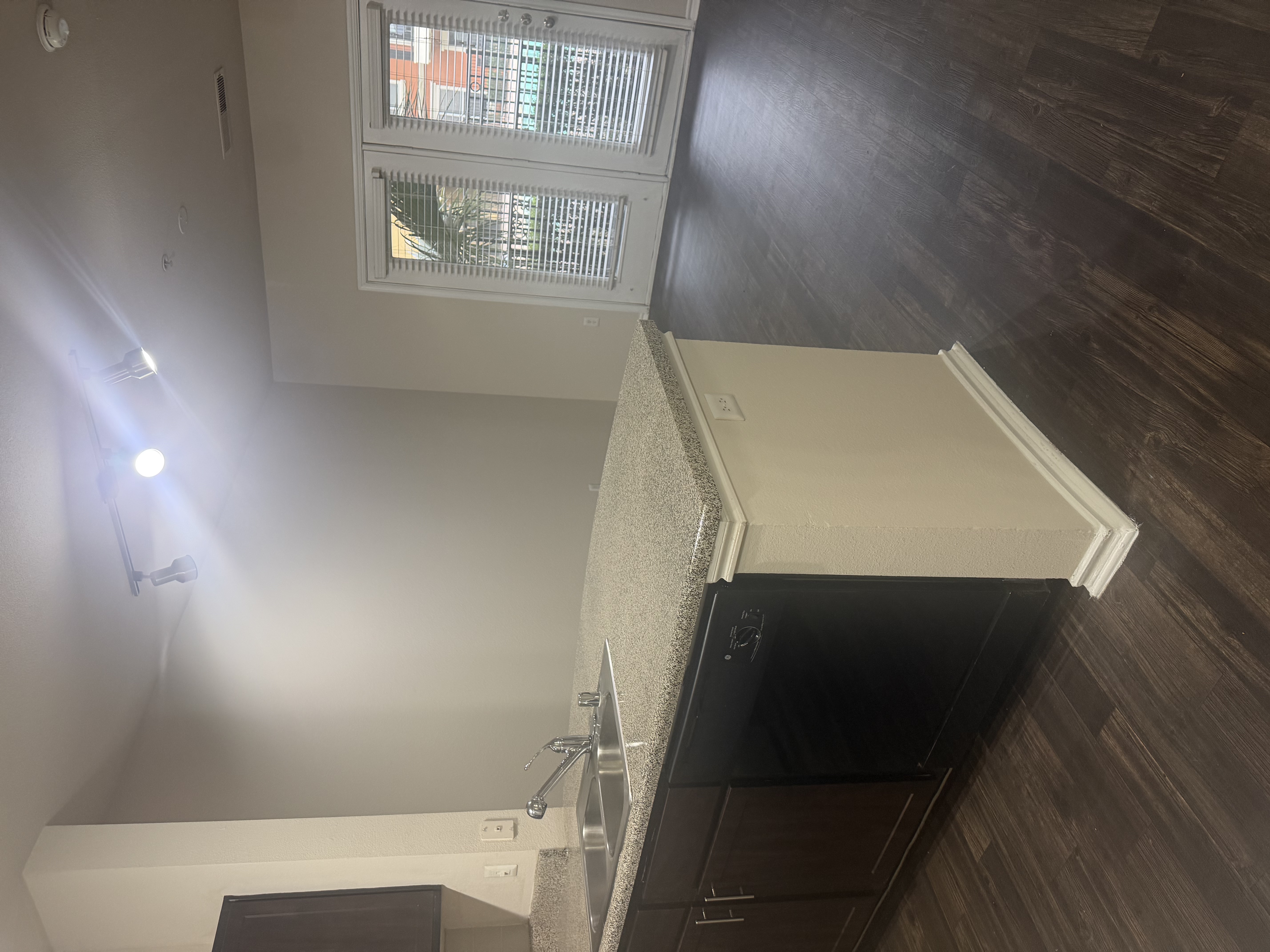 Previous kitchen and living area at Allura Las Colinas