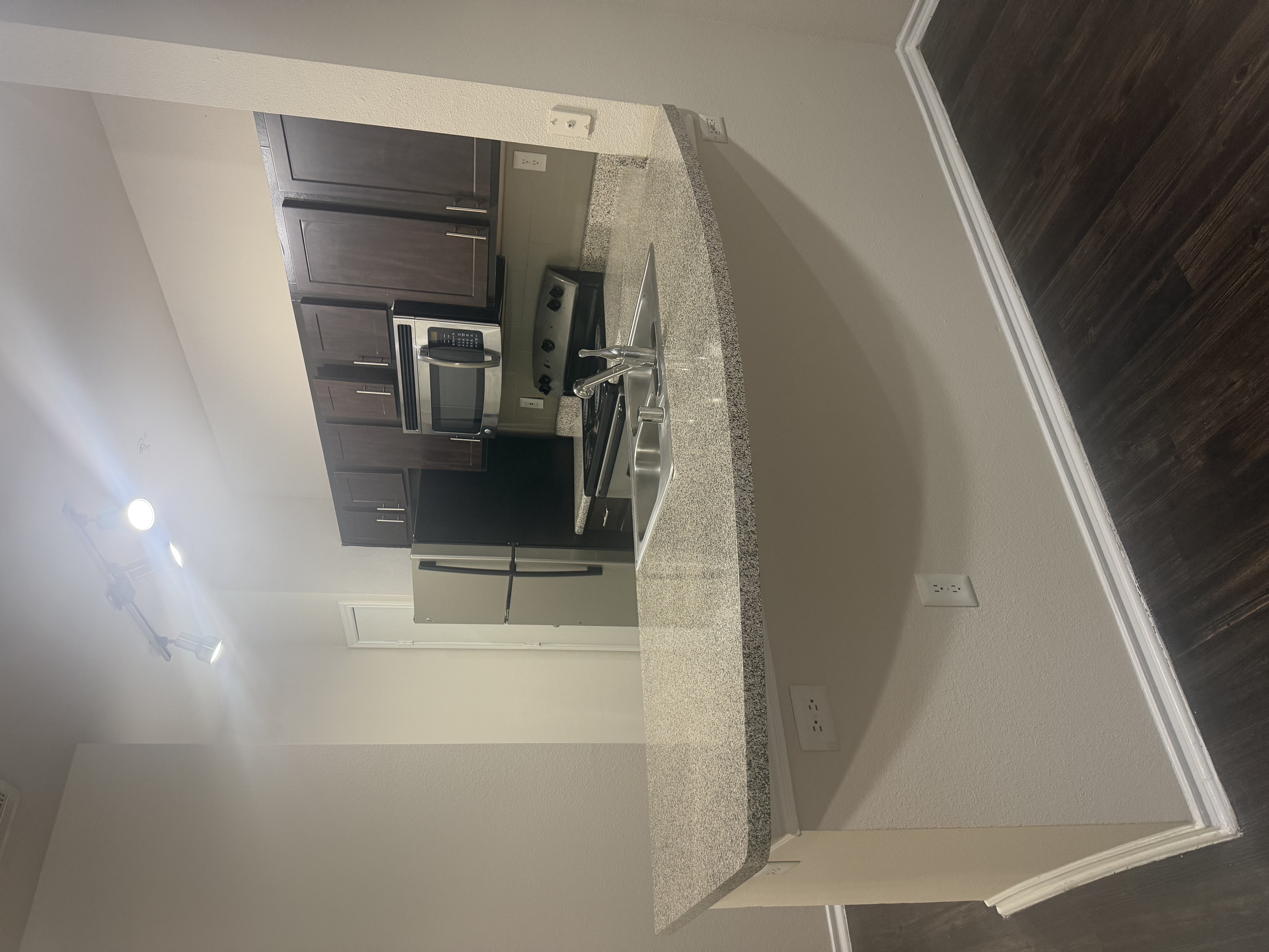 Previous kitchen breakfast bar at Allura Las Colinas